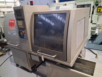 Tornio a fantina mobile a 5 assi Cnc Gildemeister GD32-5A