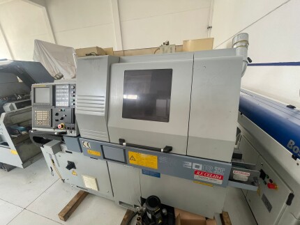 Tornio a fantina mobile a 5 assi Cnc
