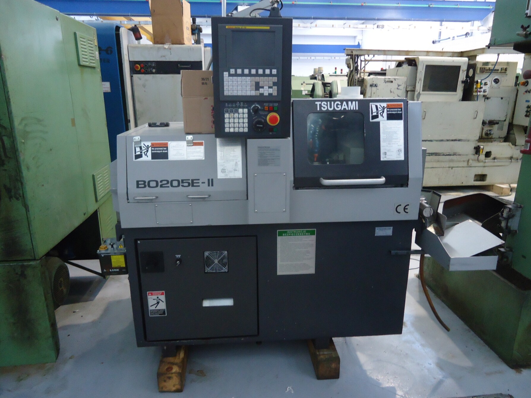 Tornio a fantina mobile a 5 assi Cnc Tsugami BO205E-II