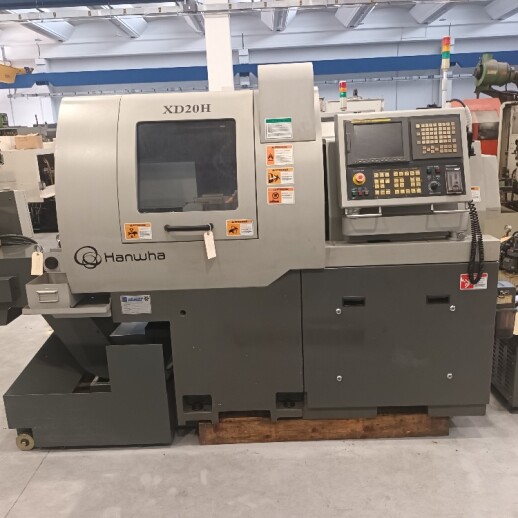 Tornio a fantina mobile a 5 assi Cnc Hanwha XD-20H