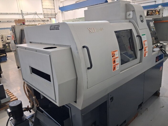 Tornio a fantina mobile a 5 assi Cnc Hanwha XD-38H